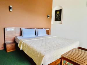 Letto o letti in una camera di The SkyDeck Kandy