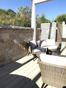 Ein Balkon oder eine Terrasse in der Unterkunft Casa Su Soli Sardu 10 - Mit Blick aufs Meer!
