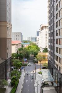 a view of a street in a city with buildings at Smile Home Tresor apartment - Modern comfortable in Ho Chi Minh City