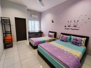 Ένα ή περισσότερα κρεβάτια σε δωμάτιο στο Amazing Holiday