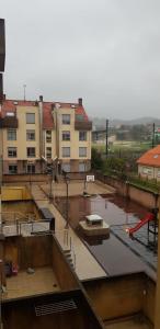 a view of a flooded street with some buildings at Maravilloso apartamento en Villagarcia de Arosa in Vilagarcia de Arousa