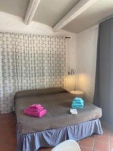 Postel nebo postele na pokoji v ubytování B&B Etico La Casa di Toti