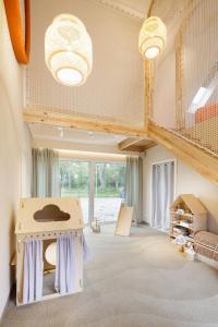 Ένα ή περισσότερα κρεβάτια σε δωμάτιο στο Przylądek Marzeń - Domy nad morzem