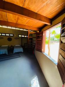 a room with two beds and a window at BeachResidence- KiteAliCori , Macapa' in Luis Correia