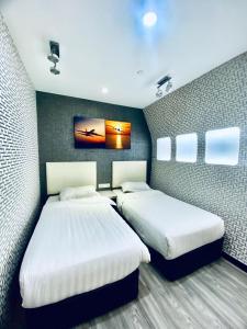 Postel nebo postele na pokoji v ubytování Sri Langit Hotel KLIA, KLIA 2 & F1 + 37 fotografií