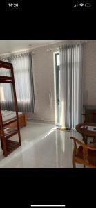 Postel nebo postele na pokoji v ubytování MOTEL MINH ANH