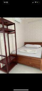 Postel nebo postele na pokoji v ubytování MOTEL MINH ANH