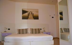 Letto o letti in una camera di Alle Porte
