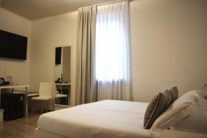 Letto o letti in una camera di Alle Porte