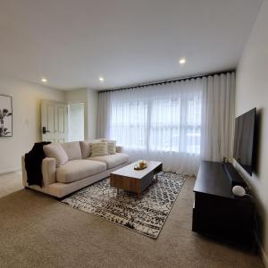 Area tempat duduk di Inner City 2 Bedroom Unit