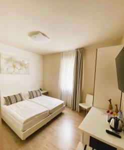 Letto o letti in una camera di Alle Porte