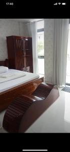 Postel nebo postele na pokoji v ubytování MOTEL MINH ANH