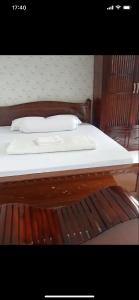 Postel nebo postele na pokoji v ubytování MOTEL MINH ANH
