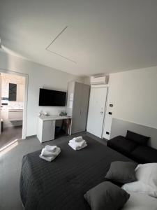 Postel nebo postele na pokoji v ubytování B&B A due passi dal mare