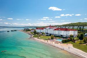 an aerial view of a resort on the beach at Inn at Bay Harbor, Autograph Collection in Petoskey