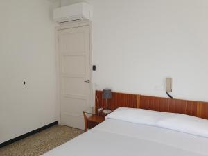 Voodi või voodid majutusasutuse Hotel Zoagli toas