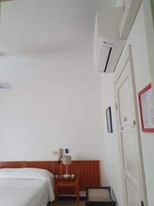 Voodi või voodid majutusasutuse Hotel Zoagli toas