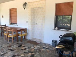 a dining room with a table and a window at Taverna Costa dei Trabocchi in Fossacesia