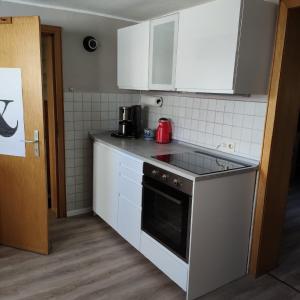 Kuchyň nebo kuchyňský kout v ubytování FeWo Altstadt BL