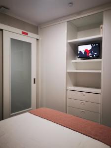 TV a/nebo společenská místnost v ubytování Apartamento MS