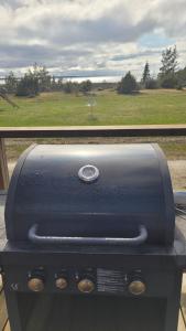 a metal box sitting on top of a table at Seaside cottage Rebase Kuur in Keibu