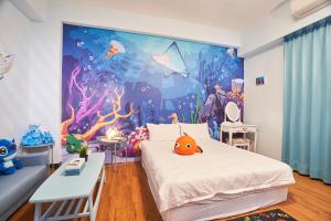 Postel nebo postele na pokoji v ubytování Ching Yu Rou B&B