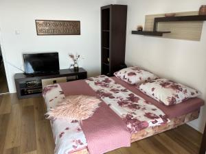 Кровать или кровати в номере Apartments Luna