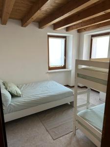 Postel nebo postele na pokoji v ubytování Casa Matilde - Residence Cà Vecchia