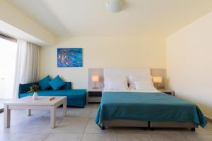 Кровать или кровати в номере Ariadne Beach - Adults Only