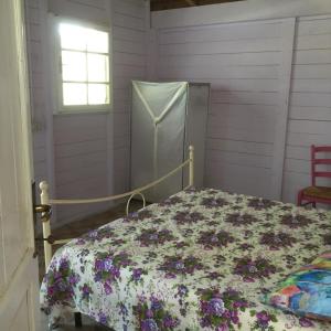 Ένα ή περισσότερα κρεβάτια σε δωμάτιο στο Fiordiloto