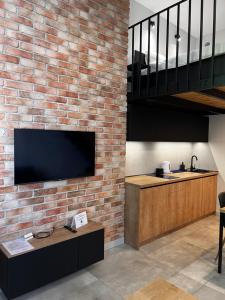 Kuchyňa alebo kuchynka v ubytovaní Property Apart - plac Jana Pawla II Centrum
