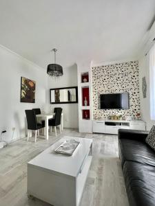 a living room with a couch and a table at Apartment Kiki in Kotor