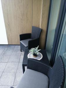 Posedenie v ubytovaní Apartament Zielone Wzgórze 2