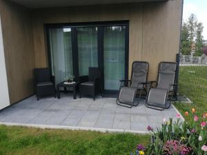 Vonkajšia záhrada v ubytovaní Apartament Zielone Wzgórze 2