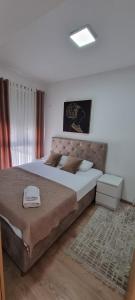 Postel nebo postele na pokoji v ubytování Adrijana Apartments