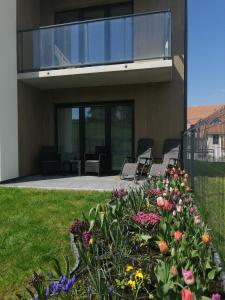 Vonkajšia záhrada v ubytovaní Apartament Zielone Wzgórze 2