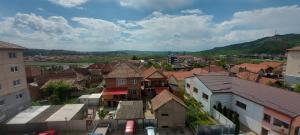 an overhead view of a town with houses and buildings at Apartament Blaj in Blaj