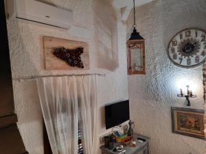 A television and/or entertainment centre at Il Nido 1