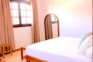 Postel nebo postele na pokoji v ubytování Dar Maria - Maison d'hôtes