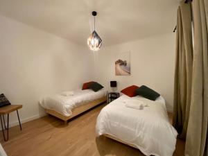 Postel nebo postele na pokoji v ubytování Appartement Centre ville, Cannes le Suquet