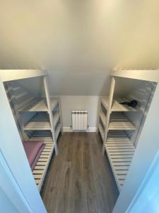 an attic room with empty shelves at Castle View Rooms in Liscannor