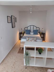 Postel nebo postele na pokoji v ubytování Nuevo loft el carpintero