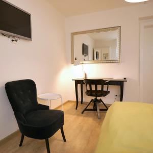 Telewizja i/lub zestaw kina domowego w obiekcie Hotel Villa Rückert