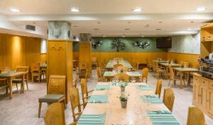 En restaurant eller et andet spisested på Hotel Jaqués