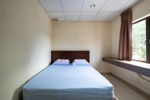 Postel nebo postele na pokoji v ubytování CLP perai homstay in perai