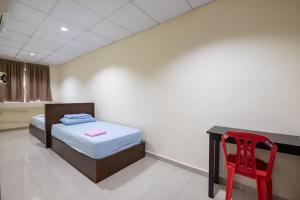 Postel nebo postele na pokoji v ubytování CLP perai homstay in perai