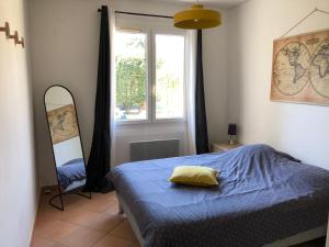 Postel nebo postele na pokoji v ubytování Gîte « les rives de l’Ardèche »