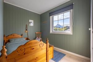 Voodi või voodid majutusasutuse Sundet Lofoten Holiday House toas +37 fotot