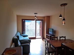 TV a/nebo společenská místnost v ubytování Apartamento muy espacioso y luminoso Erta 5