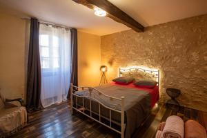 Postel nebo postele na pokoji v ubytování Domaine de Laplan + 21 fotografií